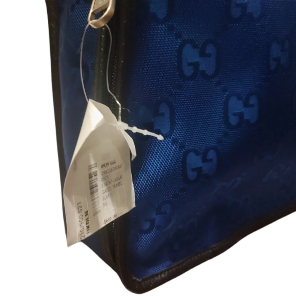 Authentic Gucci Royal Blue Travel Bag with GG Monogram Design